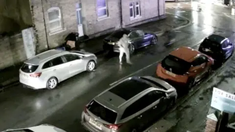 CCTV shows Sam Bevan stepping out into a road moments before an electric bike hit him