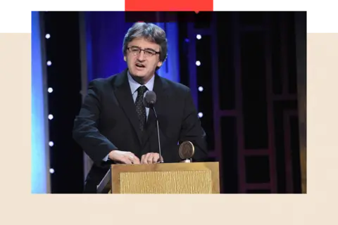 Getty Images Fergal Keane speaks onstage at an awards ceremony 