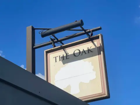 A sign for the shut pub The Oak in Whitwick