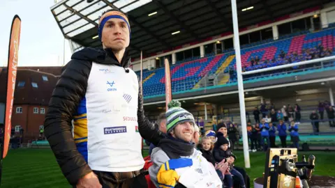 PA Media  Kevin Sinfield with Rob Burrow