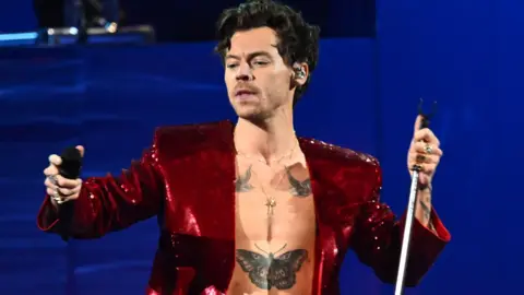 Harry Styles performs on stage during The BRIT Awards 2023 at The O2 Arena on February 11, 2023 in London, England. 