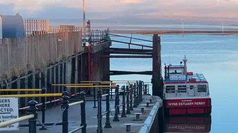 General view of the ferry and the sea