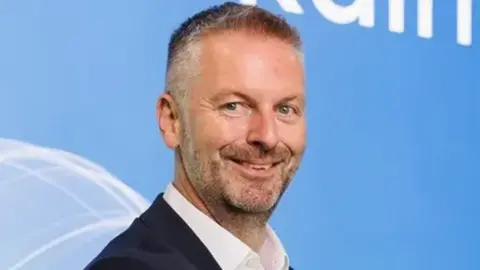 Kainos Man smiling