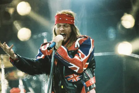 Getty Images Axl Rose of Guns N' Roses performs in a leather jacket featuring multiple interpolations of the Union flag