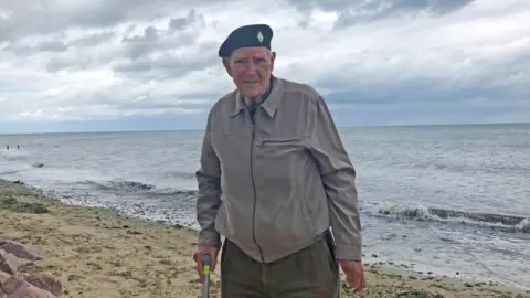 Albert Price on the beach in Normandy in 2019