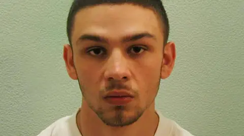 Metropolitan Police / PA Wire Jake Fahri in police mugshot wearing white t-shirt looking straight into camera