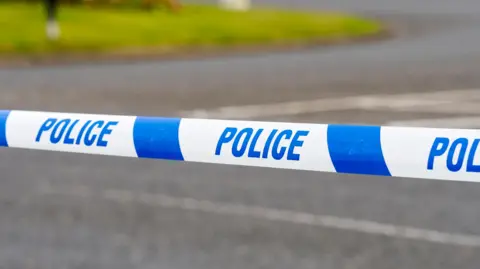 Police marker tape for cordoning crime scene
