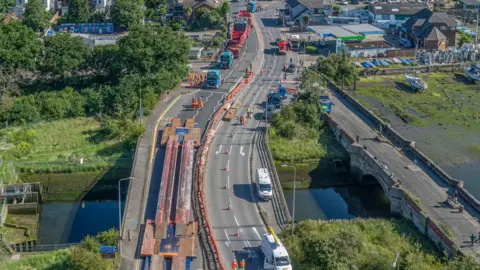 Jeff Welch An aerial photograph of the abnormal load passing through Ipswichusiness park on the edge of Luton