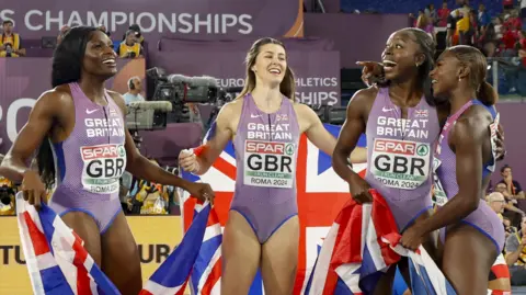 EPA-EFE/REX/Shutterstock (L-R) Gold medalists Daryll Neita, Amy Hunt, Desiree Henry and Dina Asher-Smith of Team Great Britain celebrate winning the Women's 4x100m Relay Final at the European Athletics Championships 2024 at Olimpico Stadium in Rome, Italy, 