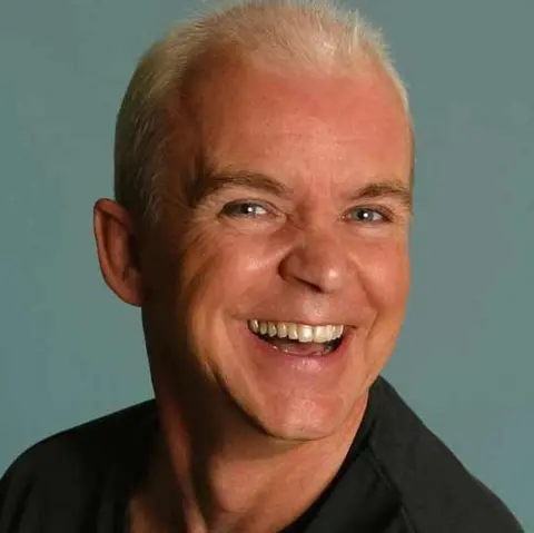 DTrik Wayne Dobson smiling