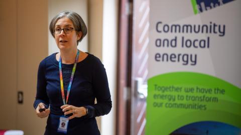 A picture of Helen Seagrave, Electricity North West’s community energy manager, leading a presentation