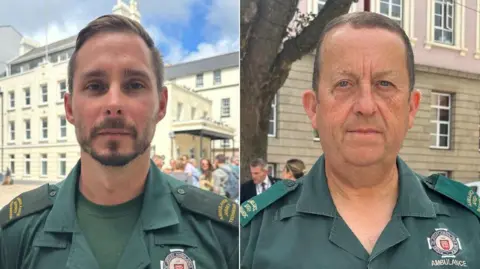BBC Tom Le Sauteur and John Sutherland, both in ambulance service uniforms, looking into the camera