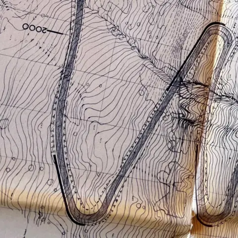 Technical drawing showing hairpin bends on the proposed road