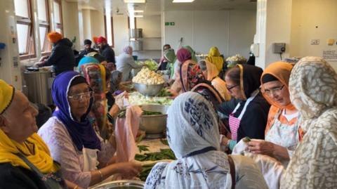 Volunteers preparing food for Vaisakhi in Gravesend