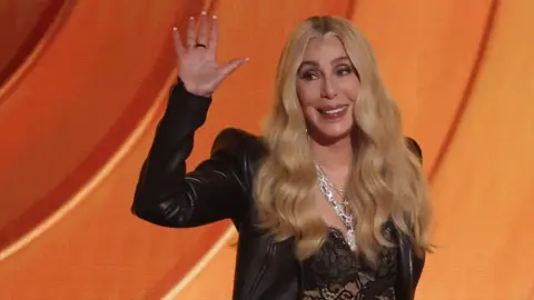 Cher on stage at the Grammys