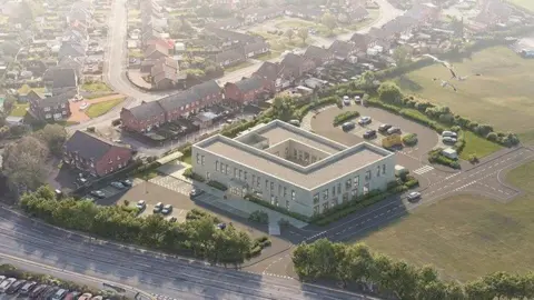 A computer-generated aerial image showing a large two-storey health centre with a car park next to it, located next to a residential estate.
