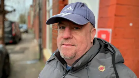 Albert Moore lives in Harpurhey, Manchester