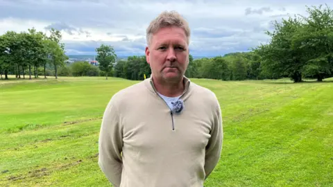 Owner of Concord Park Golf Club stood on the course in Sheffield 