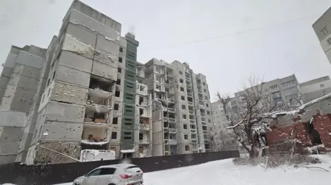 Jordan Meade Bomb damage in Ukrainian capital of Kyiv