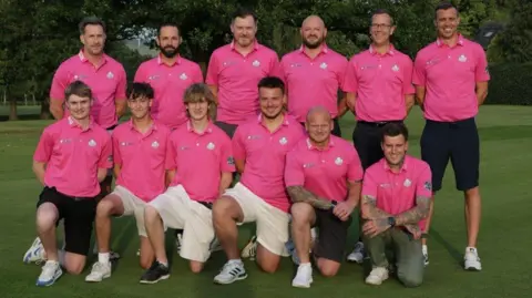 Harry Philp Harry and Freddie pictured in a team photo of all the other male members they will play with on Friday, wearing pink t-shirts and shorts and trainers, in the middle of what appears to be a golf field.