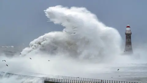 PA Media Roker pier battered by huge waves