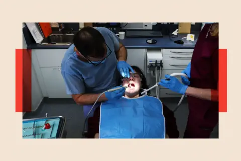 EPA-EFE/REX/Shutterstock A customer is treated at a NHS dental clinic in London