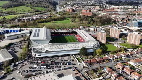 An aerial view of Ashton Gate stadium showing houses and flats nearby