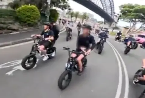 A split screen showing teens riding down a road on fatbikes in Sydney