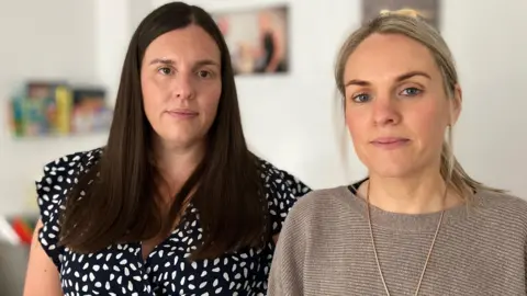 BBC Sisters Sarah Davies and Annika Thomas look   towards the camera  