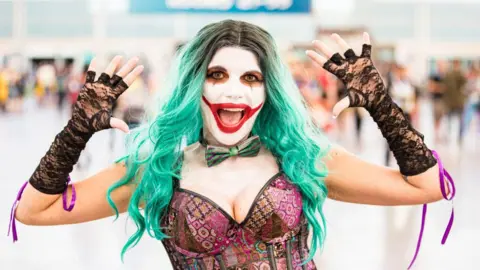 Getty Images  Cosplayer Lisa Lower-Richter dressed as the Joker on Day 2 of 2024 Comic-Con 