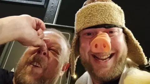 Monster Raving Loony party Sir Oink-a-Lot with a comedy nose and sheepskin hat for the upcoming by-election