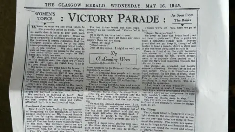 BBC/Julia Bryson A picture of a newspaper article.