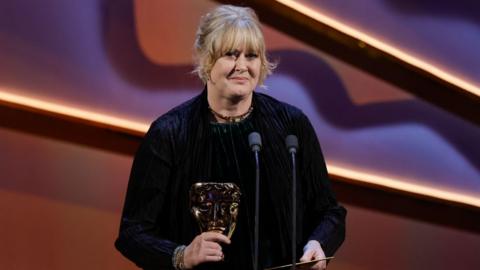Sarah Lancashire accepts the Leading Actress Award for 'Happy Valley' onstage during the 2024 BAFTA Television Awards with P&O Cruises at The Royal Festival Hall on May 12, 2024 in London, England.