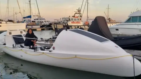 Ananya Prasad Ms Prasad on her boat which is moored at a marina