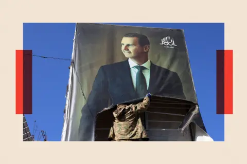 Getty Images An anti-government combatant  tears down   a representation    of Syria's President Bashar al-Assad successful  Aleppo