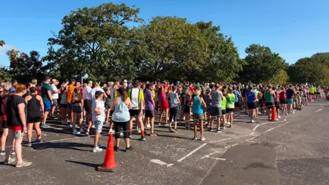 Runners on the start line at Weymouth's Parkrun