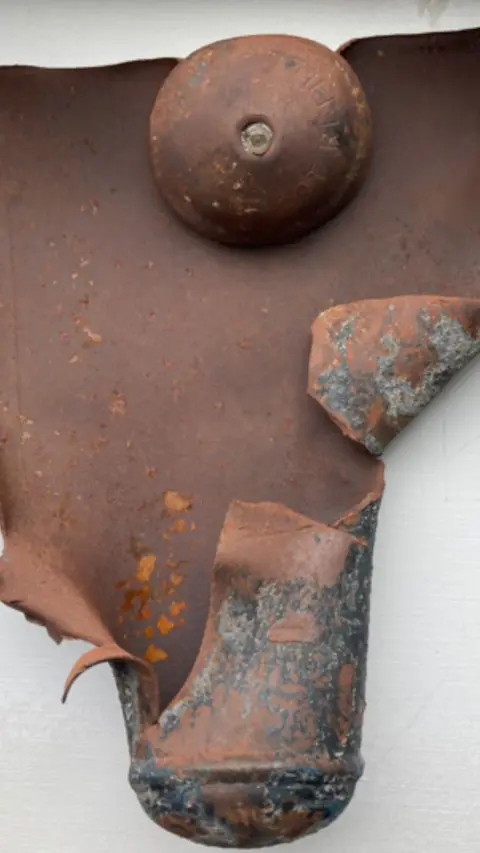 The inside of an exploded gas canister.