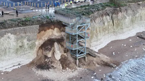 Eddie Mitchell Tonnes of rock on the beach in January, right next to the steps.