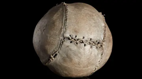 An almost 500-year-old football with thick stitching