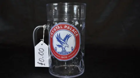 Trevor Prideaux An empty Crystal Palace beer stein with a zero price tag