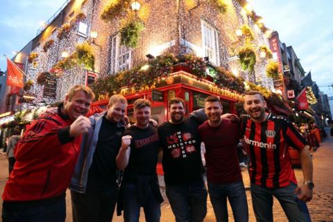 A group of Bayer Leverkusen fans outside The Temple Bar pub