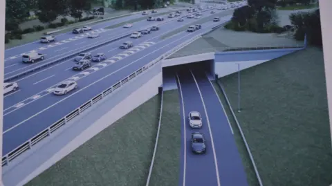 National Highways An artist's impression of the new junction with a tunnel underneath the A11 dual carriageway and slip roads.