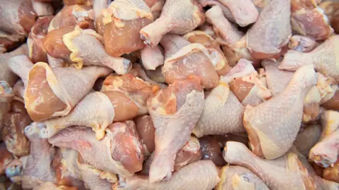 Dozens of raw chicken legs