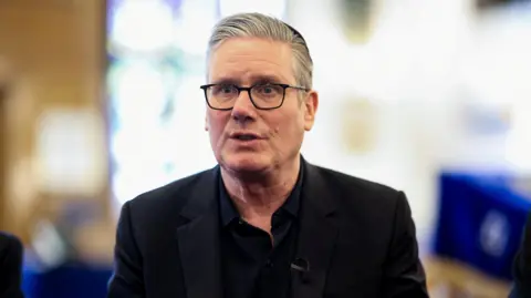 Reuters Sir Keir Starmer visits Kenton United Synagogue on April 23, which was recently targeted in an arson attack.