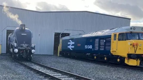 The LNER Class A4 Sir Nigel Gresley and a Class 50 049