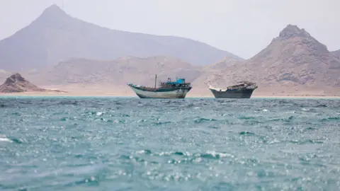 Boats float near the coast of Bab el-Mandeb, Yemen April 2, 2026.