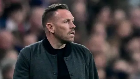 Craig Bellamy looks concerned during Wales' defeat to England
