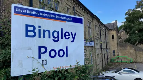 BBC A Bradford Council sign outside Bingley Pool