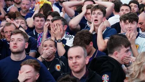 Scotland fans looking dejected