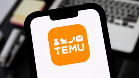 Getty Images Temu app is pictured on a smartphone screen